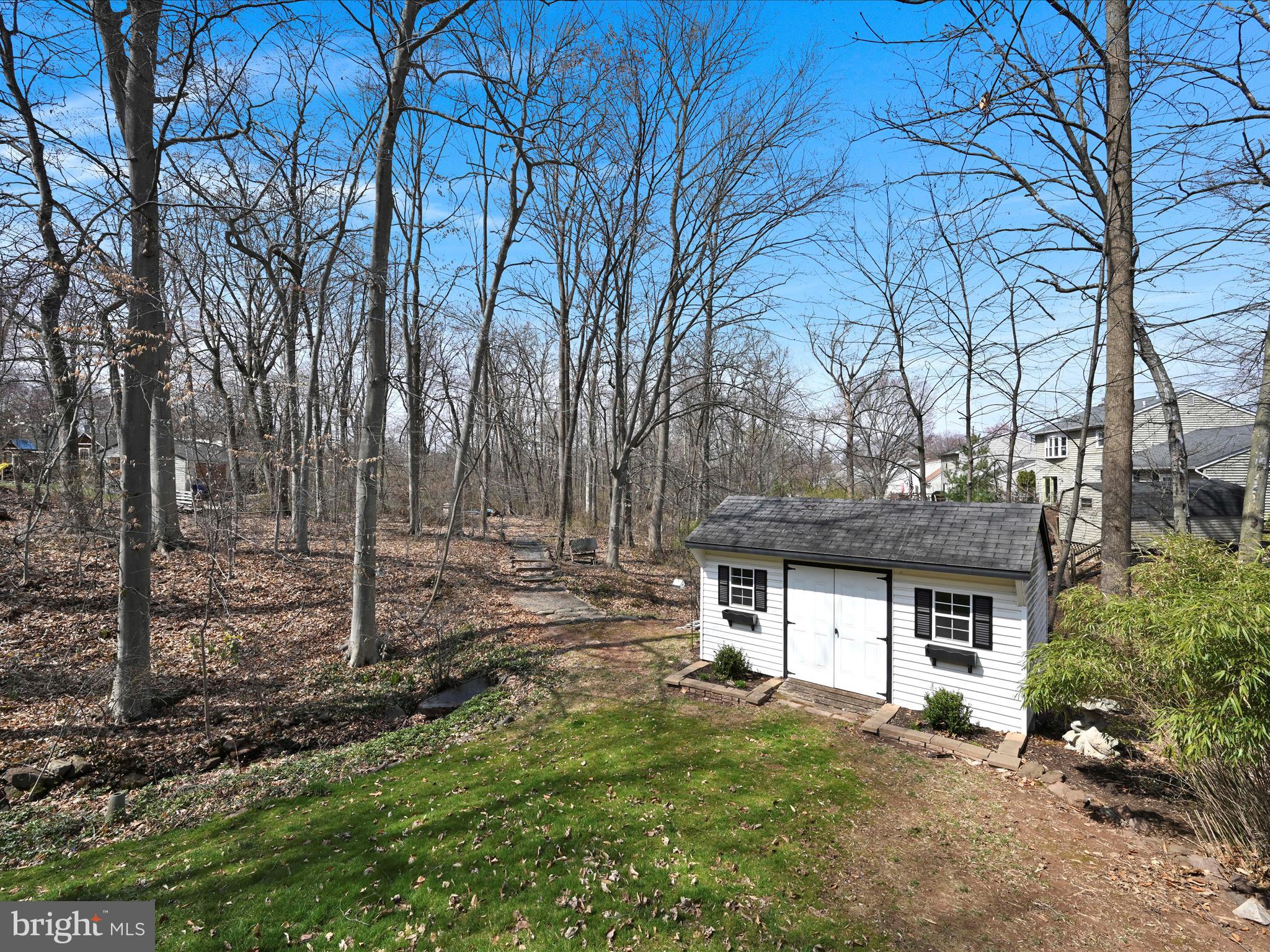 5 T-992 Stevens, PA 17578 - Photo 30 of 34 front view of a house with a yard