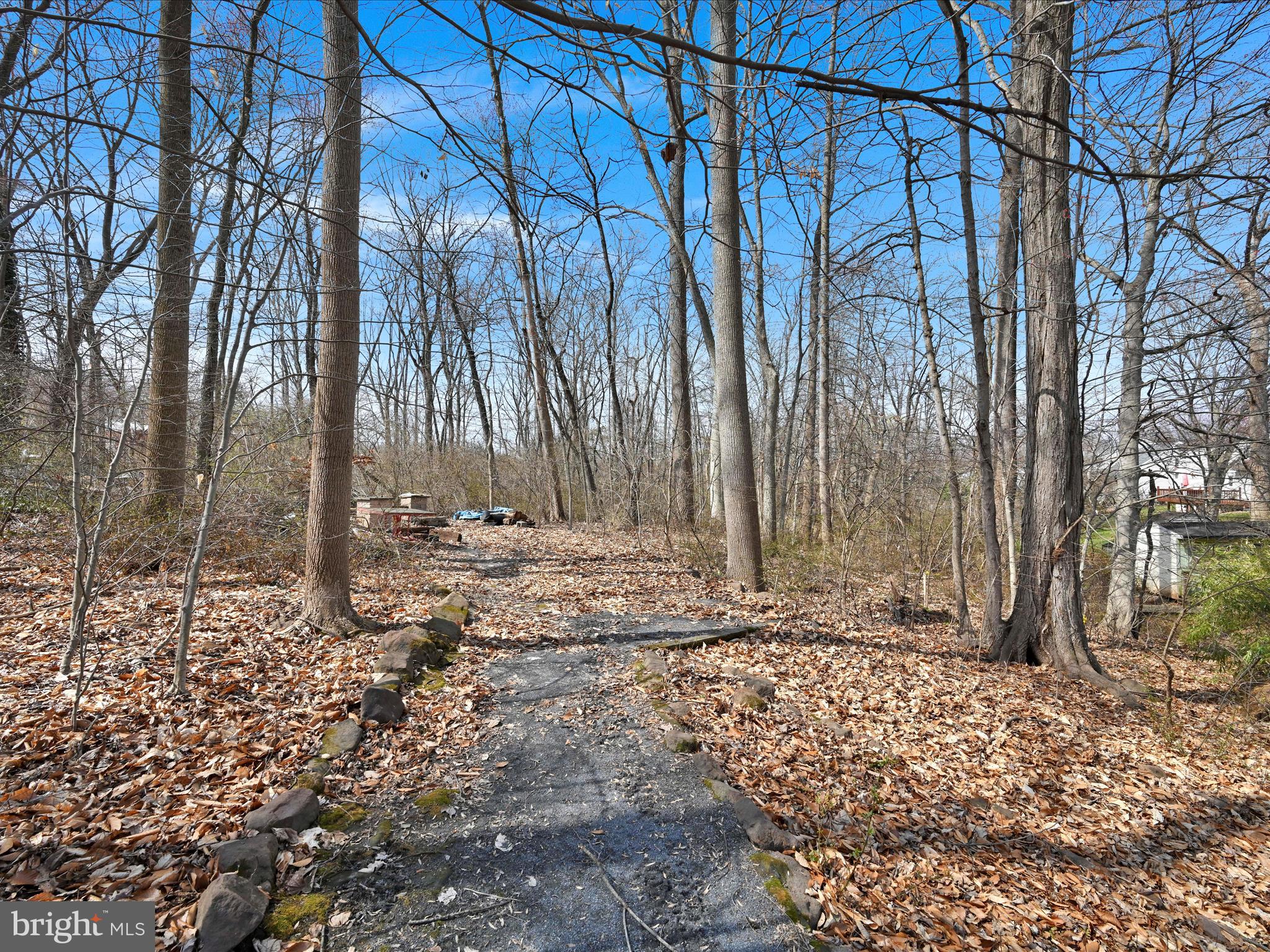 5 T-992 Stevens, PA 17578 - Photo 32 of 34 a backyard of a house with lots of green space