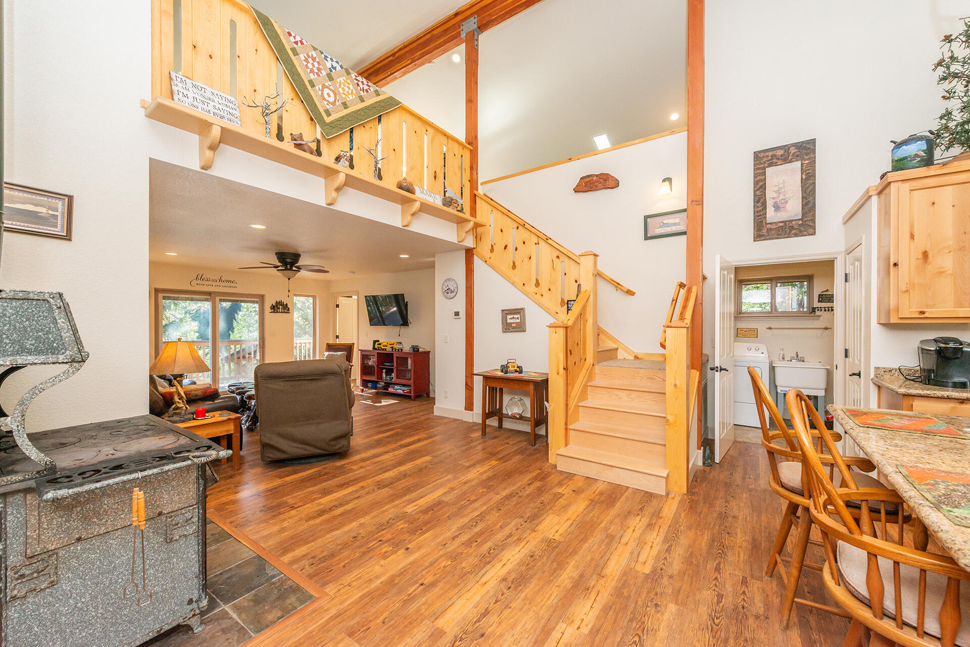 851 Mountain Aire Road Trinity Center, CA 96091 - Photo 20 of 54 a living room with furniture and a wooden floor
