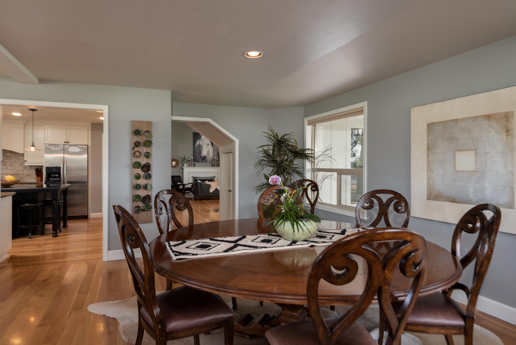 64495 Research Road Bend, OR 97703 - Photo 20 of 54 a dining room with furniture and window