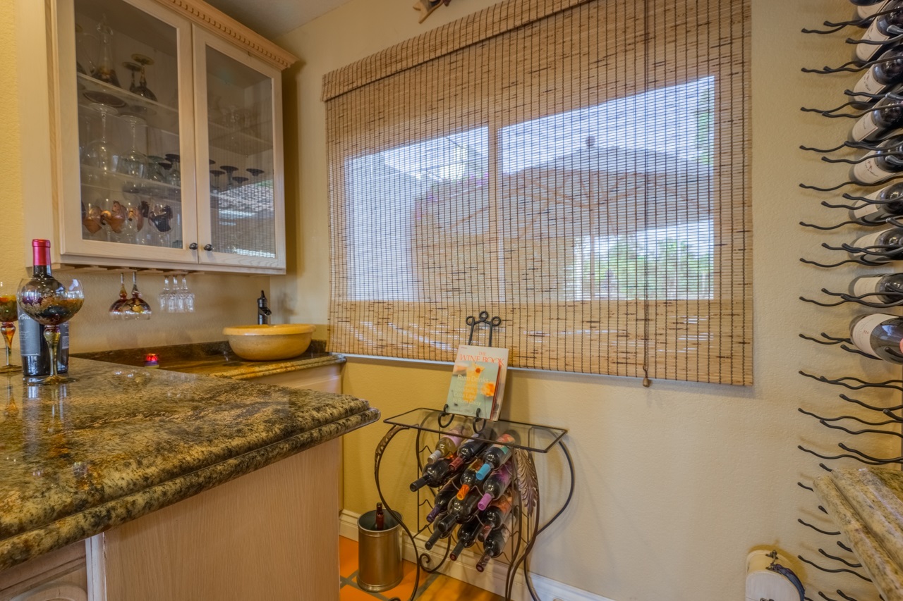 30133 Miller Road Valley Center, CA 92082 - Photo 10 of 25 Brilliant wine area in living room, with dual temperature wine fridge, and more.