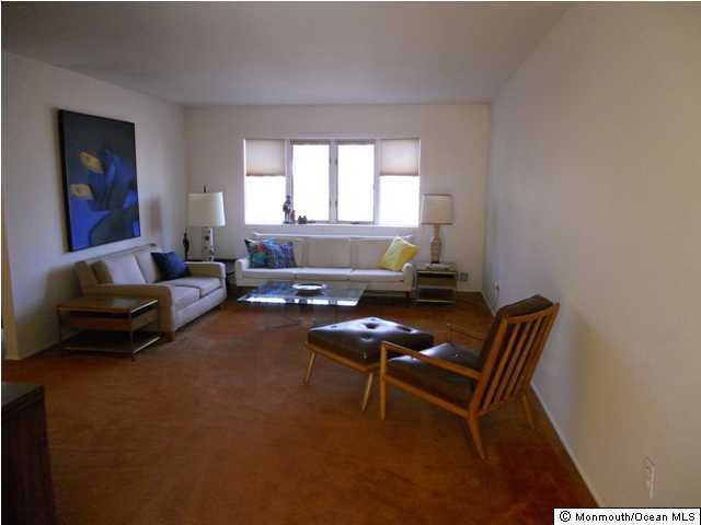 25 Kettle Creek Road Freehold, NJ 07728 - Photo 3 of 3 a living room with furniture and a window