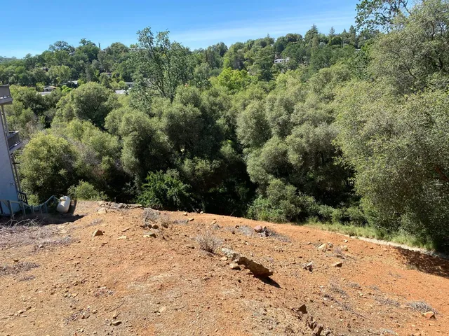 a view of a yard covered in snow