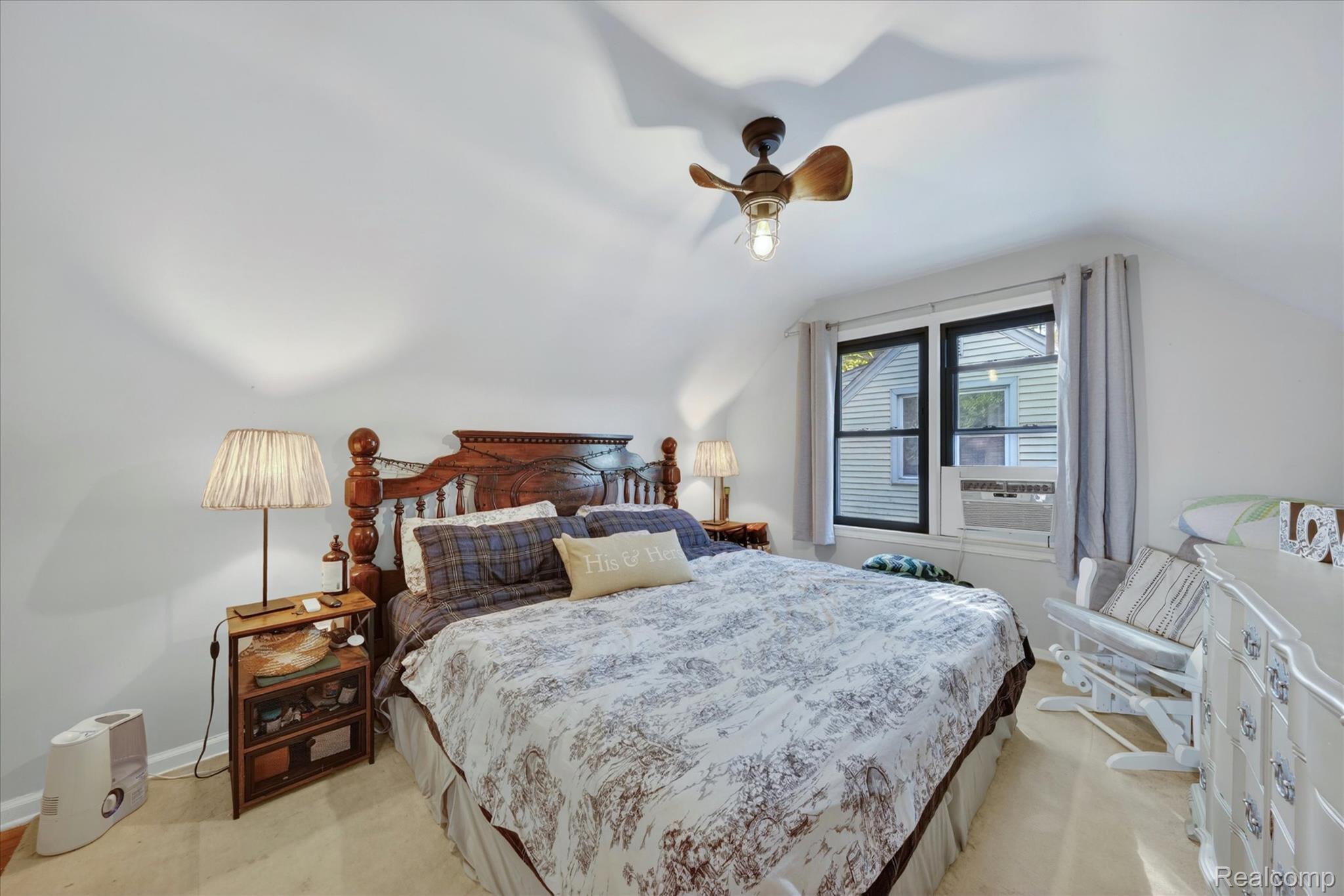 22729 Cleveland Street Dearborn, MI 48124 - Photo 16 of 32 Interior room featuring a sloped ceiling and light-toned walls