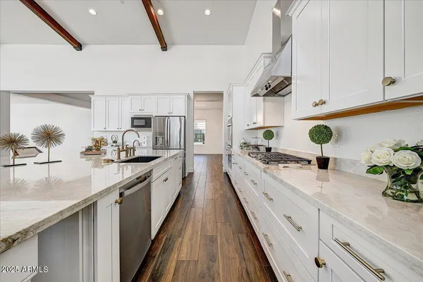 a bed room with a bed and a chair