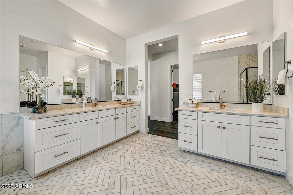 9407 South 13th Way Phoenix, AZ 85042 - Photo 15 of 33 a spacious bathroom with a granite countertop sink mirror and a