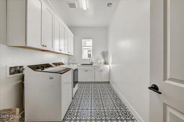 a view of a kitchen with wooden floor and closet