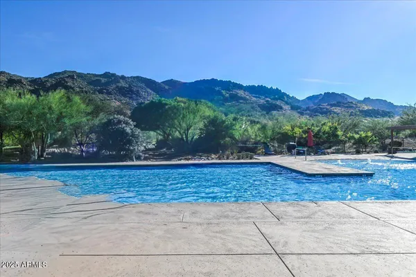 a view of a table and chairs in the garden