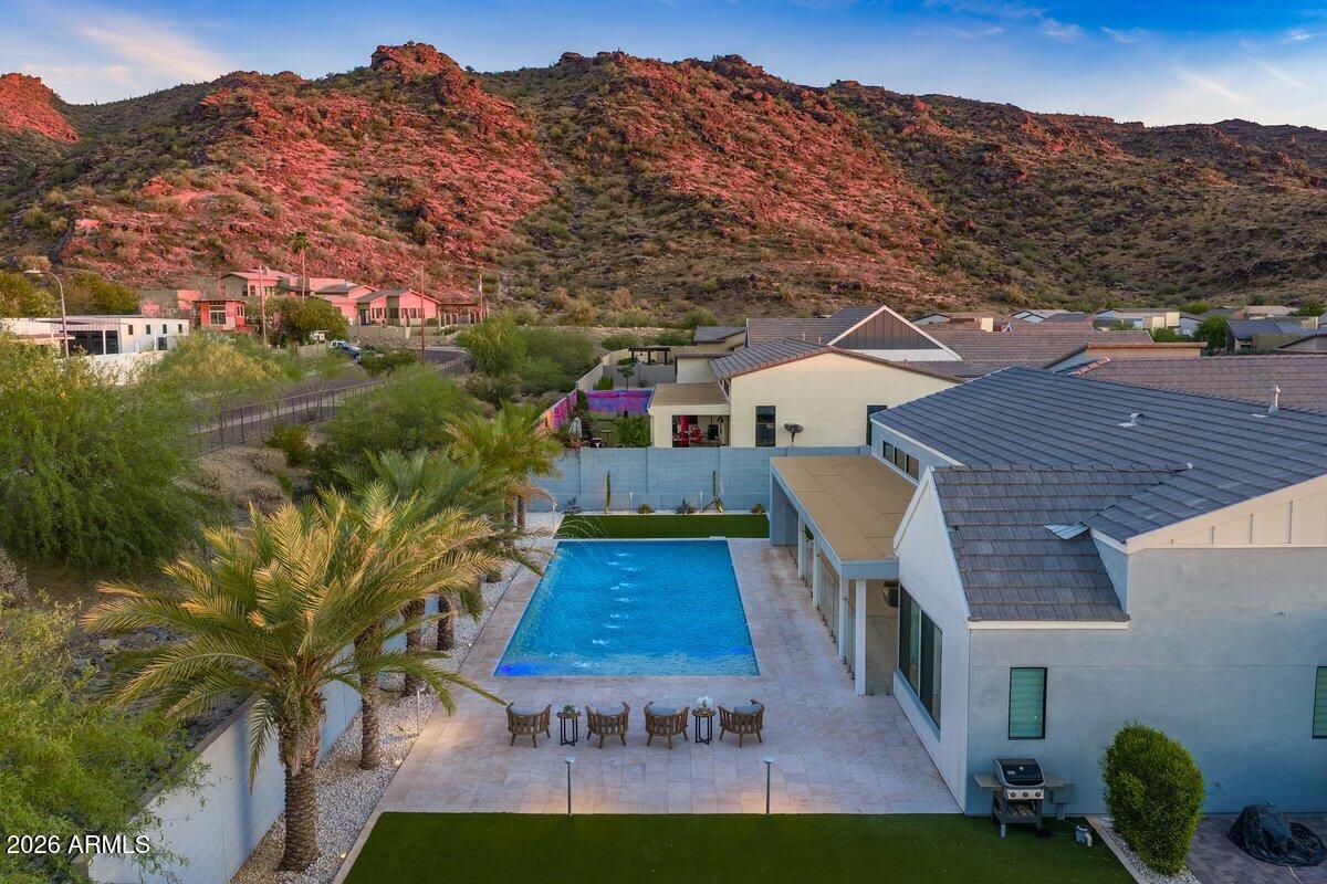 9407 South 13th Way Phoenix, AZ 85042 - Photo 29 of 51 a view of a house with a yard