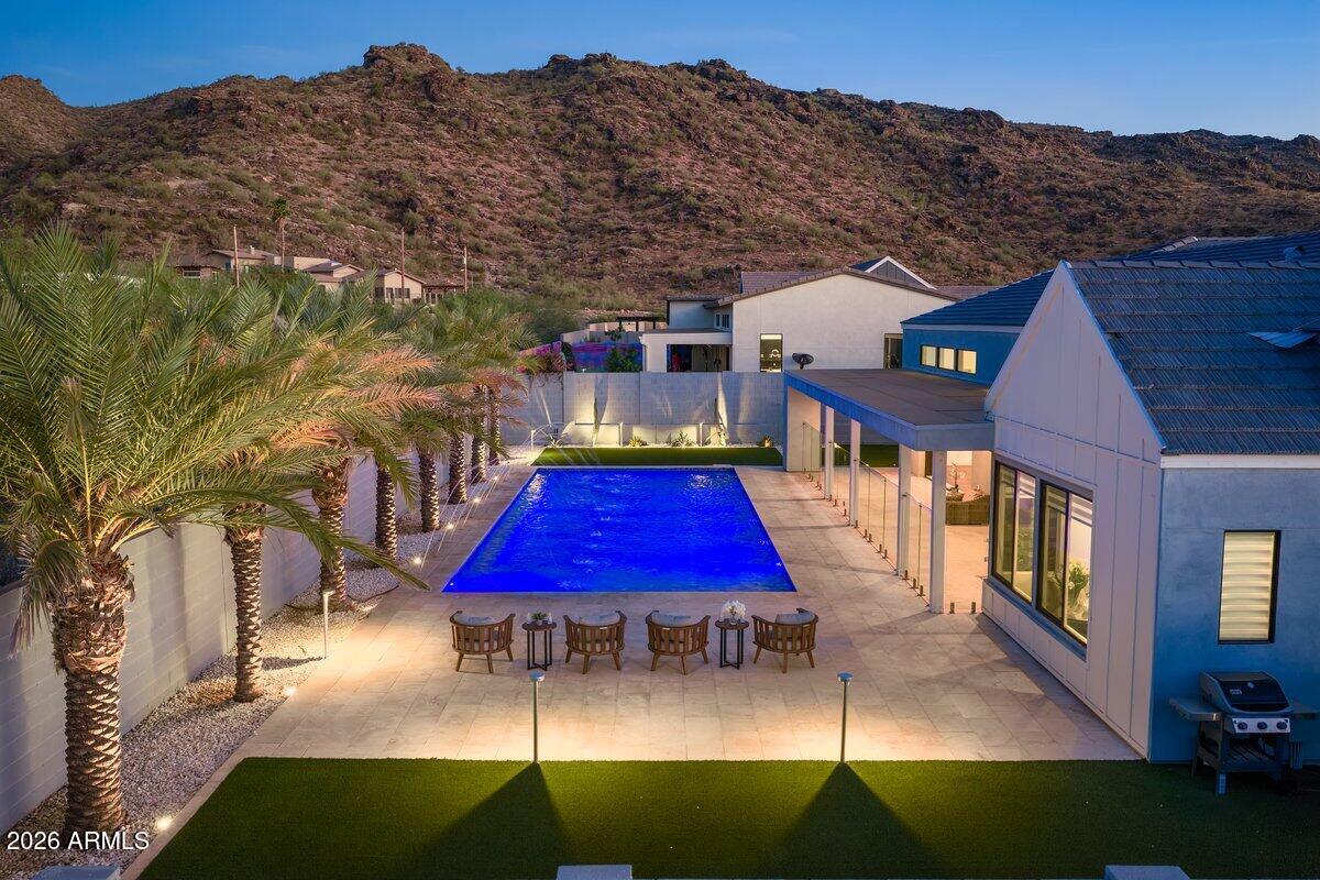 9407 South 13th Way Phoenix, AZ 85042 - Photo 32 of 51 swimming pool view with a seating space