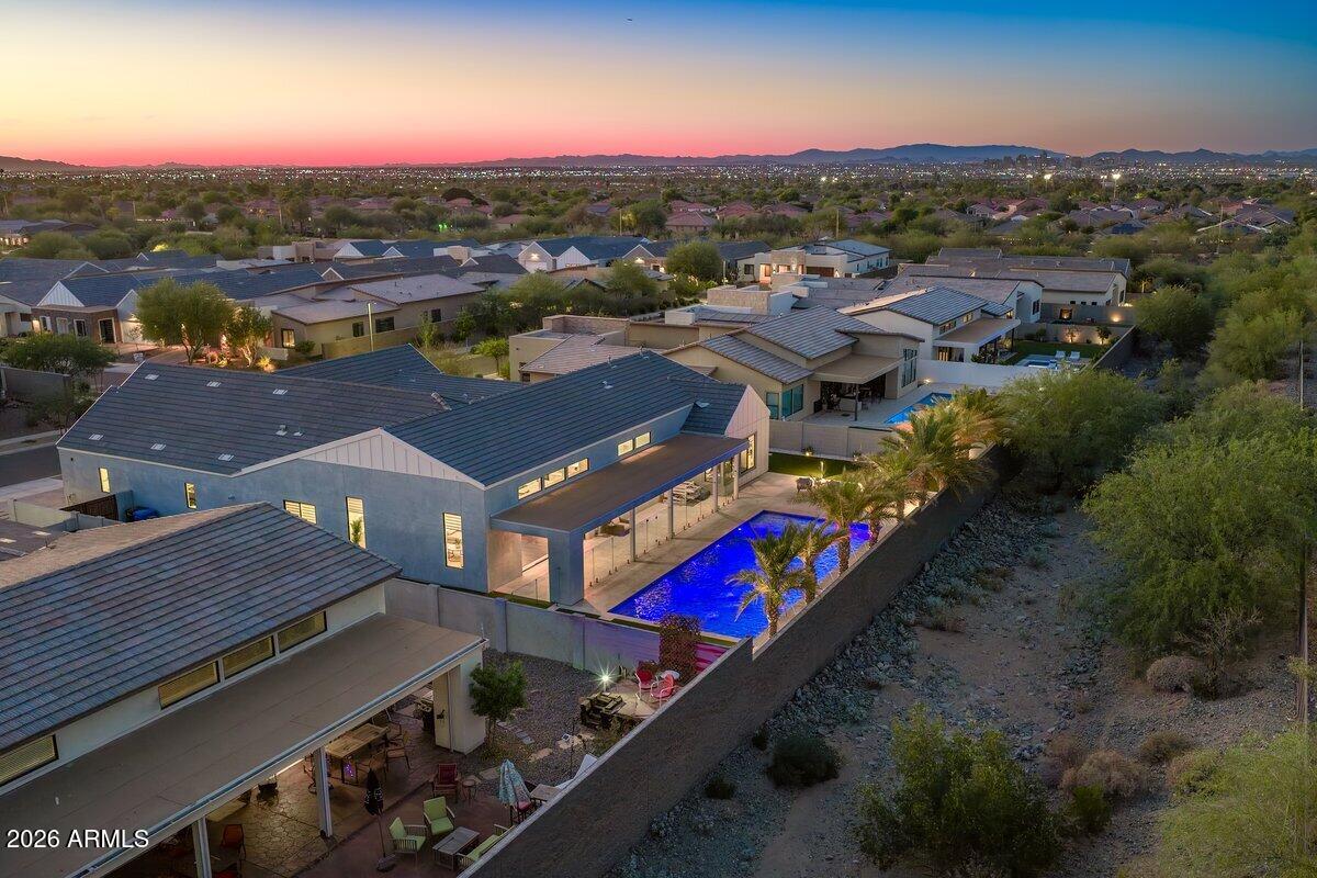 9407 South 13th Way Phoenix, AZ 85042 - Photo 33 of 51 an aerial view of residential houses with outdoor space and city view