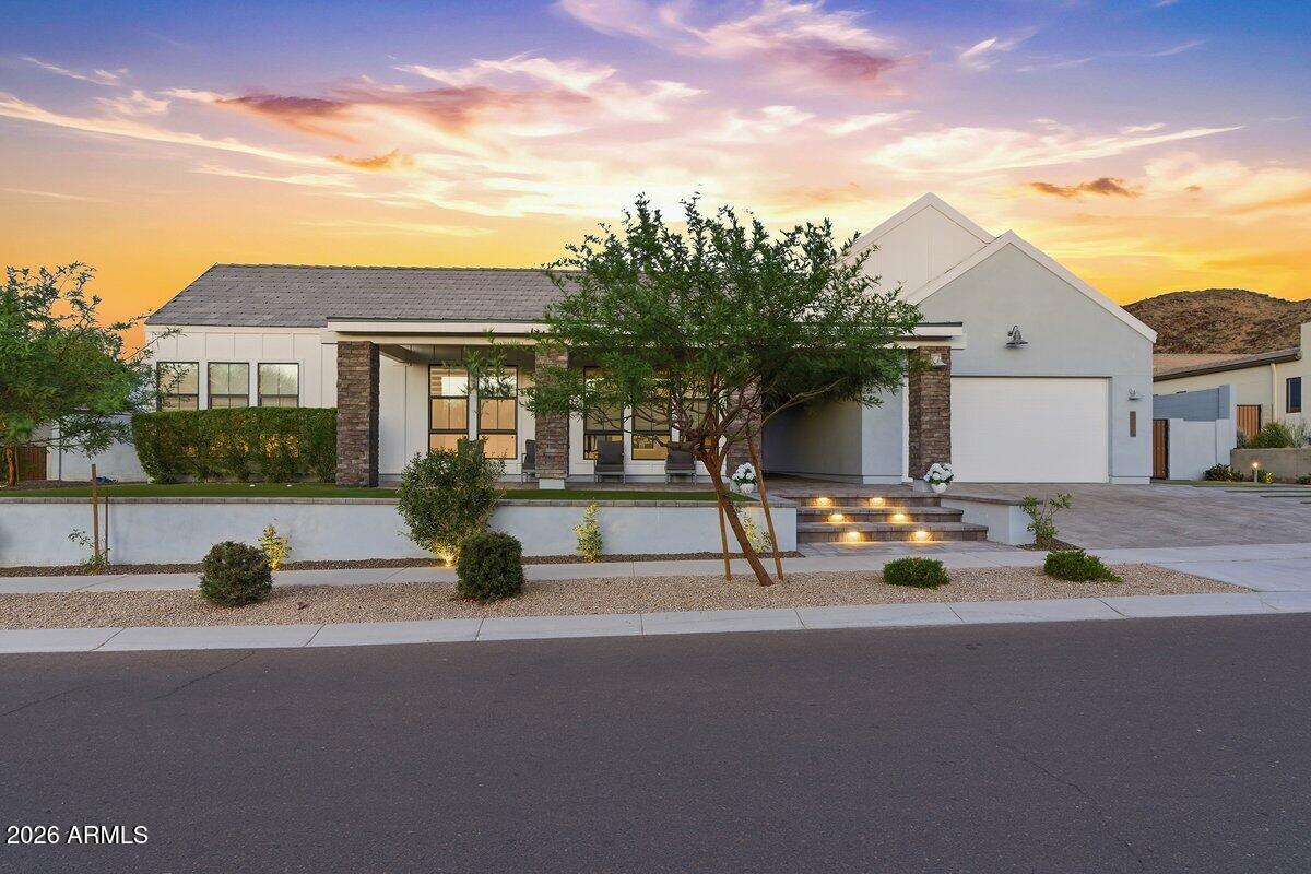 9407 South 13th Way Phoenix, AZ 85042 - Photo 45 of 51 a view of a house with outdoor space and porch