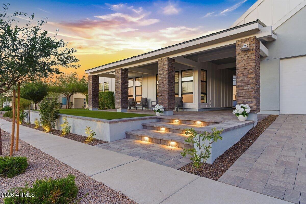 9407 South 13th Way Phoenix, AZ 85042 - Photo 46 of 51 a view of a house with a swimming pool