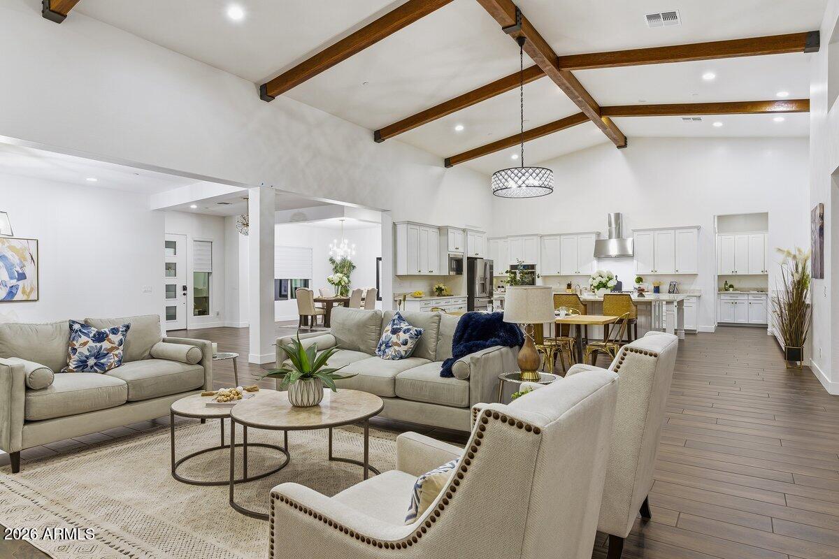 9407 South 13th Way Phoenix, AZ 85042 - Photo 48 of 51 a living room with lots of furniture and white walls
