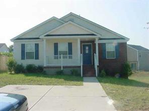 3108 Rockingham Concord, NC 28025 - Photo 2 of 8 a view of a house with a yard
