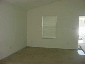 3108 Rockingham Concord, NC 28025 - Photo 5 of 8 an empty room with a window