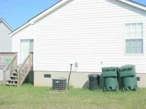 3108 Rockingham Concord, NC 28025 - Photo 8 of 8 a backyard of a house with table and chairs