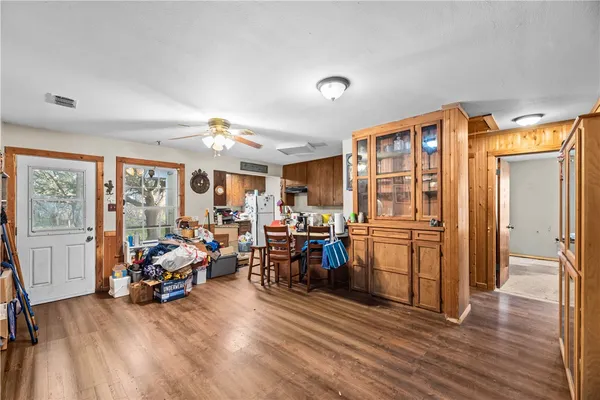 a view of a room with furniture window and wooden floor