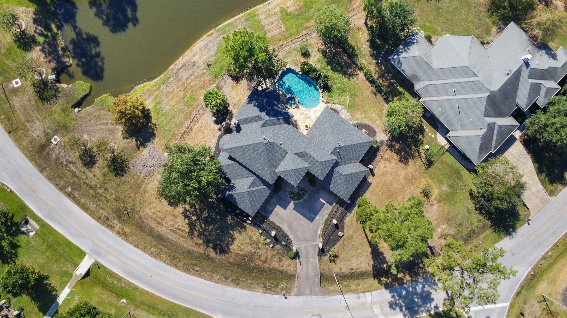 8114 Hideaway Lake Circle Spring, TX 77389 - Photo 46 of 50 an aerial view of a house with a yard and potted plants