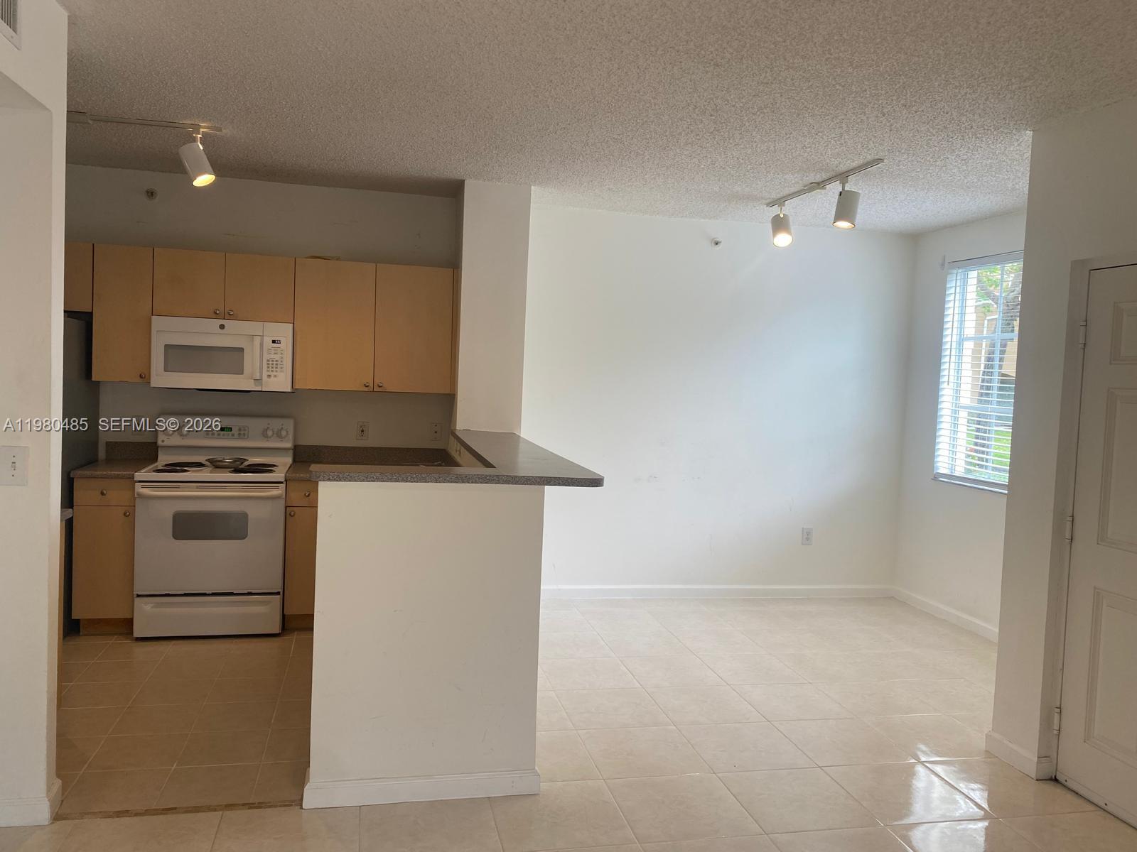 7980 North Nob Hill Road, Unit 107 Tamarac, FL 33321 - Photo 14 of 15