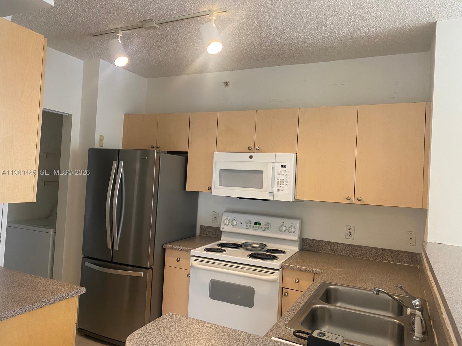 7980 North Nob Hill Road, Unit 107 Tamarac, FL 33321 - Photo 2 of 15