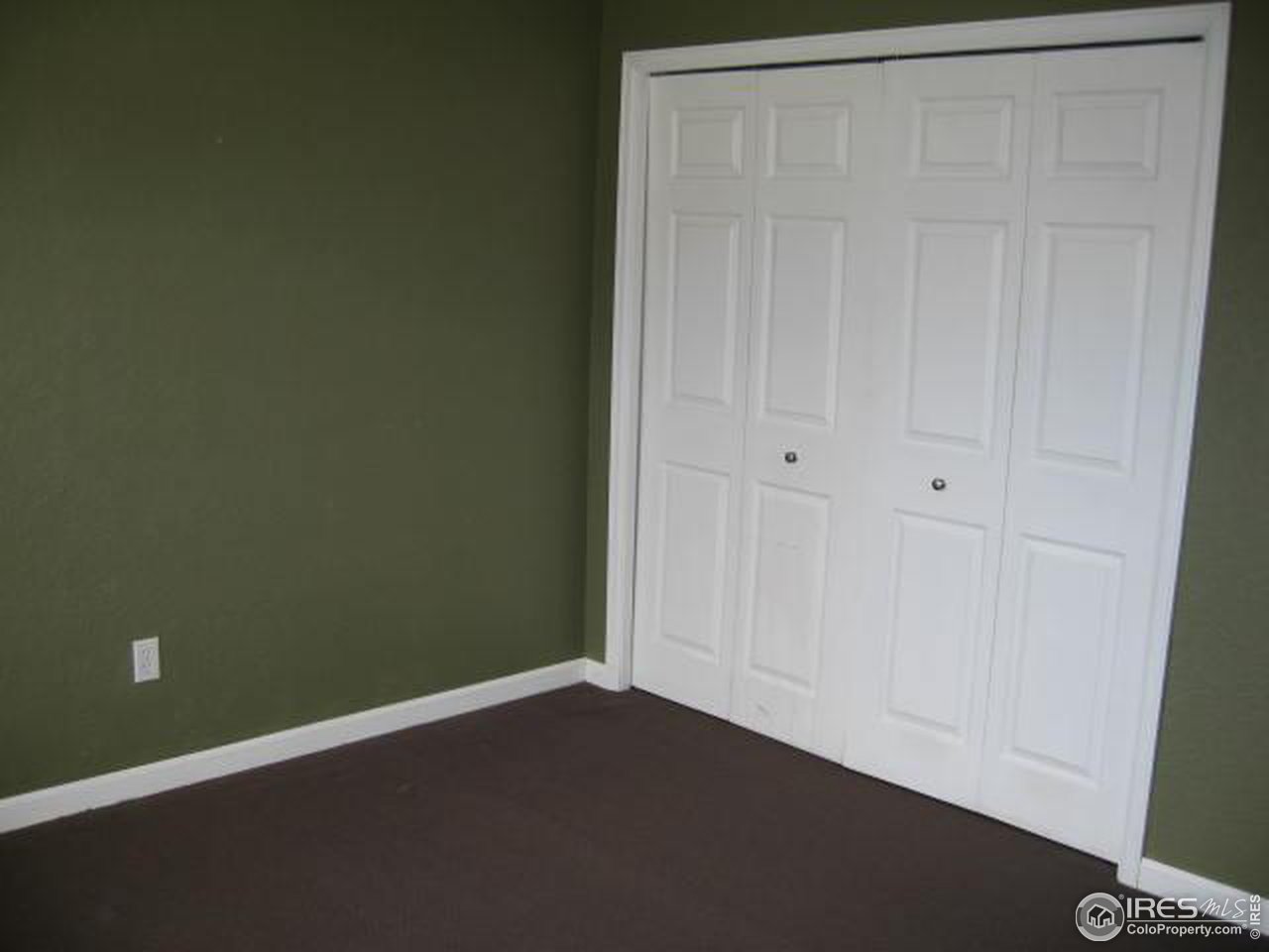 780 Walnut Street, Unit D Boulder, CO 80302 - Photo 12 of 14 an empty room with a door