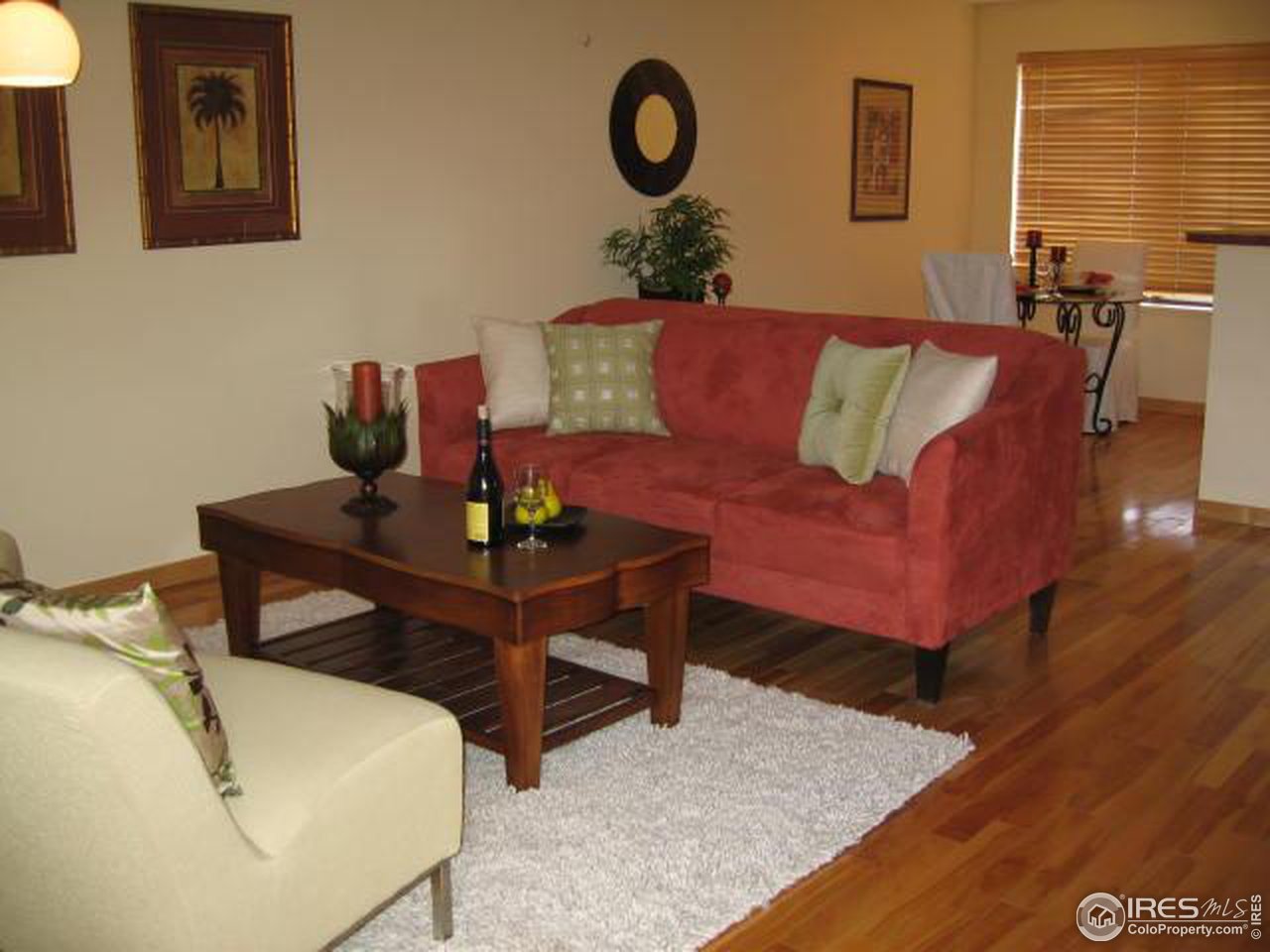 780 Walnut Street, Unit D Boulder, CO 80302 - Photo 2 of 14 a view of a livingroom with furniture and wooden floor