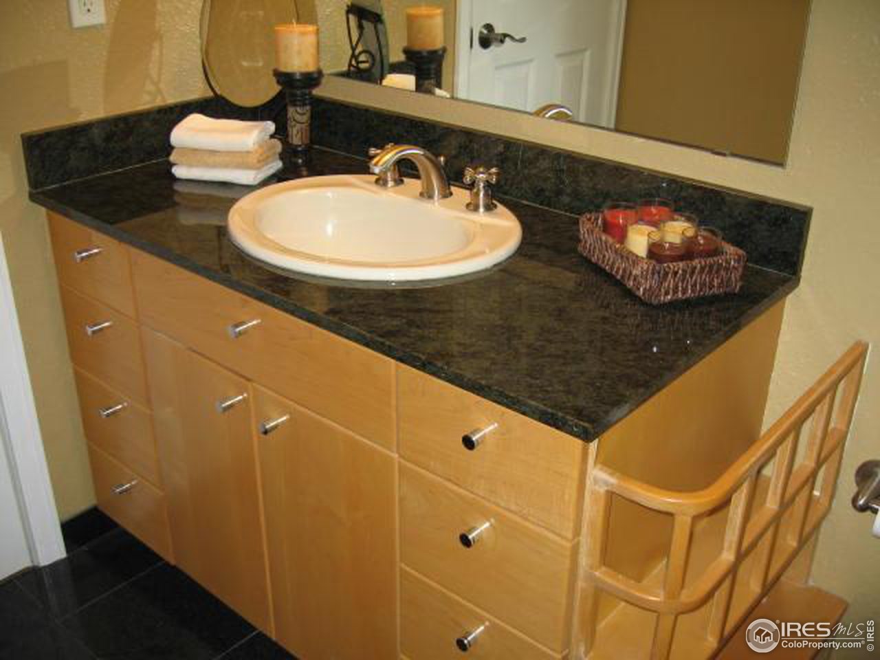 780 Walnut Street, Unit D Boulder, CO 80302 - Photo 8 of 14 a bathroom with a sink and a mirror