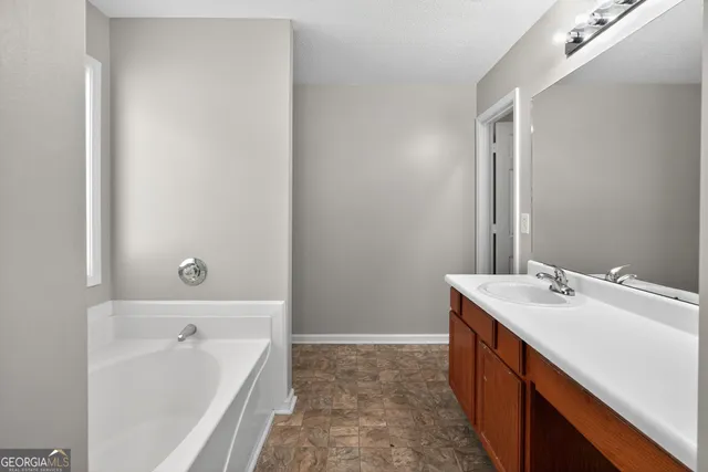 $234,900 | 7134 Ravenwood Lane, Lithonia, GA 30038