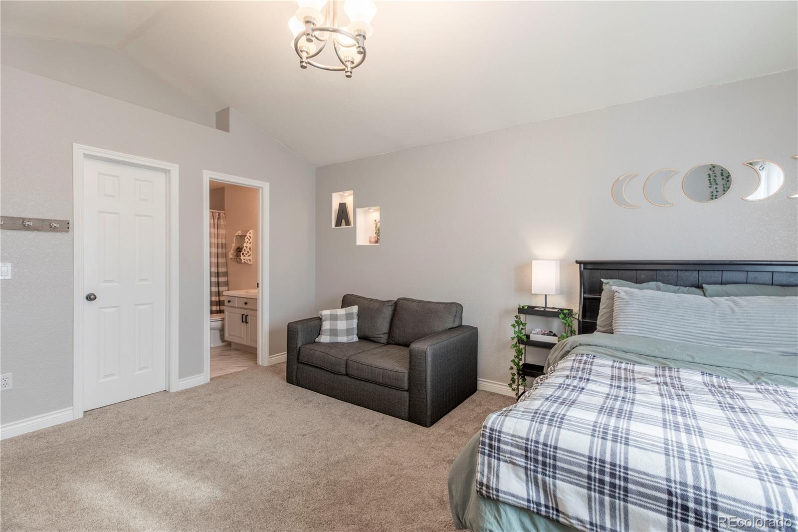 16504 Badminton Road North Platteville, CO 80651 - Photo 23 of 39 a bedroom with bed and window