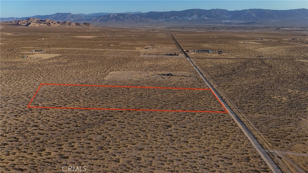 733 Harrod Road Lucerne Valley, CA 92356 - Photo 6 of 9 a view of an ocean beach and mountain