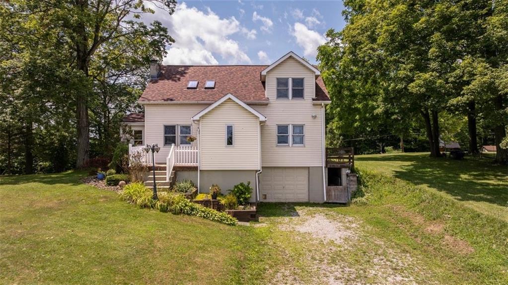 29 Profio Road McDonald, PA 15057 - Photo 1 of 44 a view of a house with backyard and sitting area