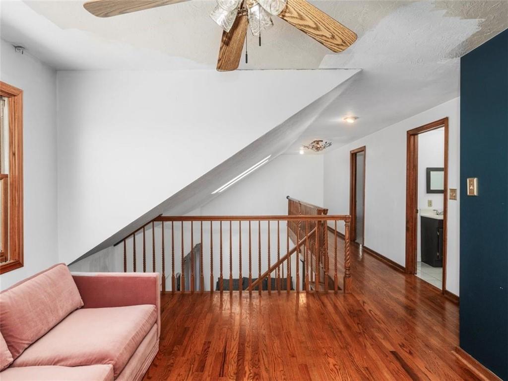 29 Profio Road McDonald, PA 15057 - Photo 16 of 44 a balcony with wooden floor and furniture