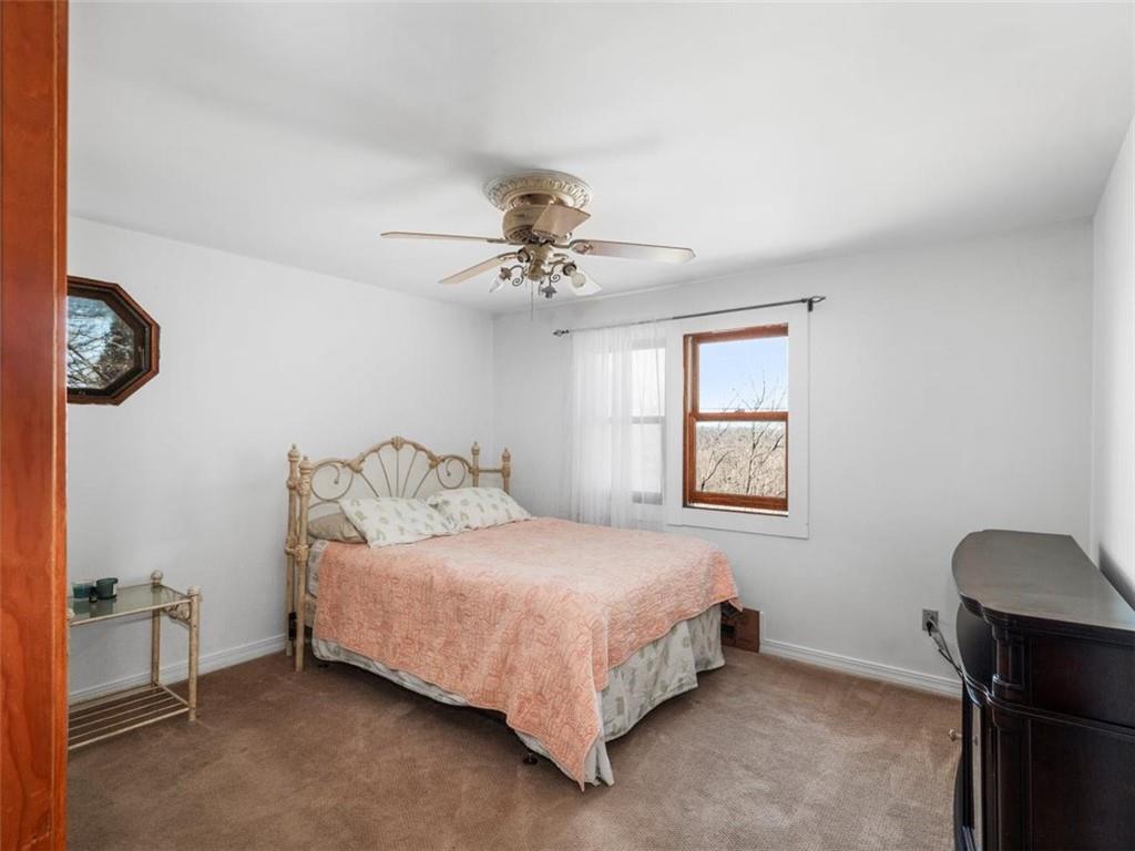 29 Profio Road McDonald, PA 15057 - Photo 18 of 44 a bedroom with a bed and a ceiling fan