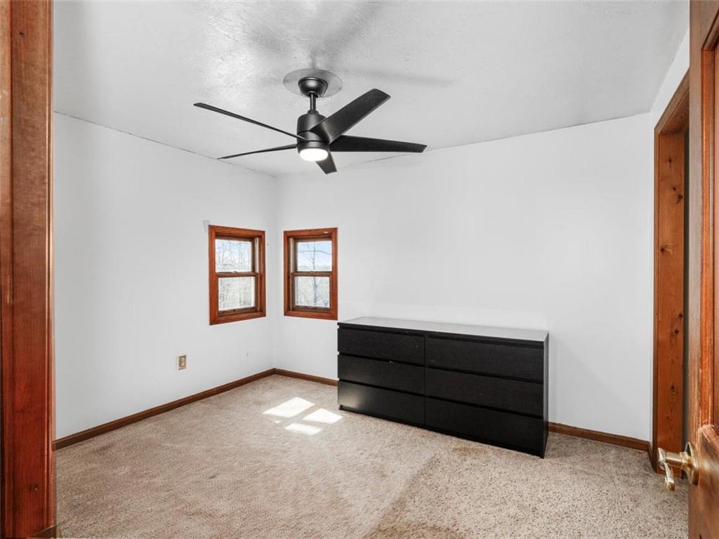29 Profio Road McDonald, PA 15057 - Photo 20 of 44 a view of room with a ceiling fan and a window