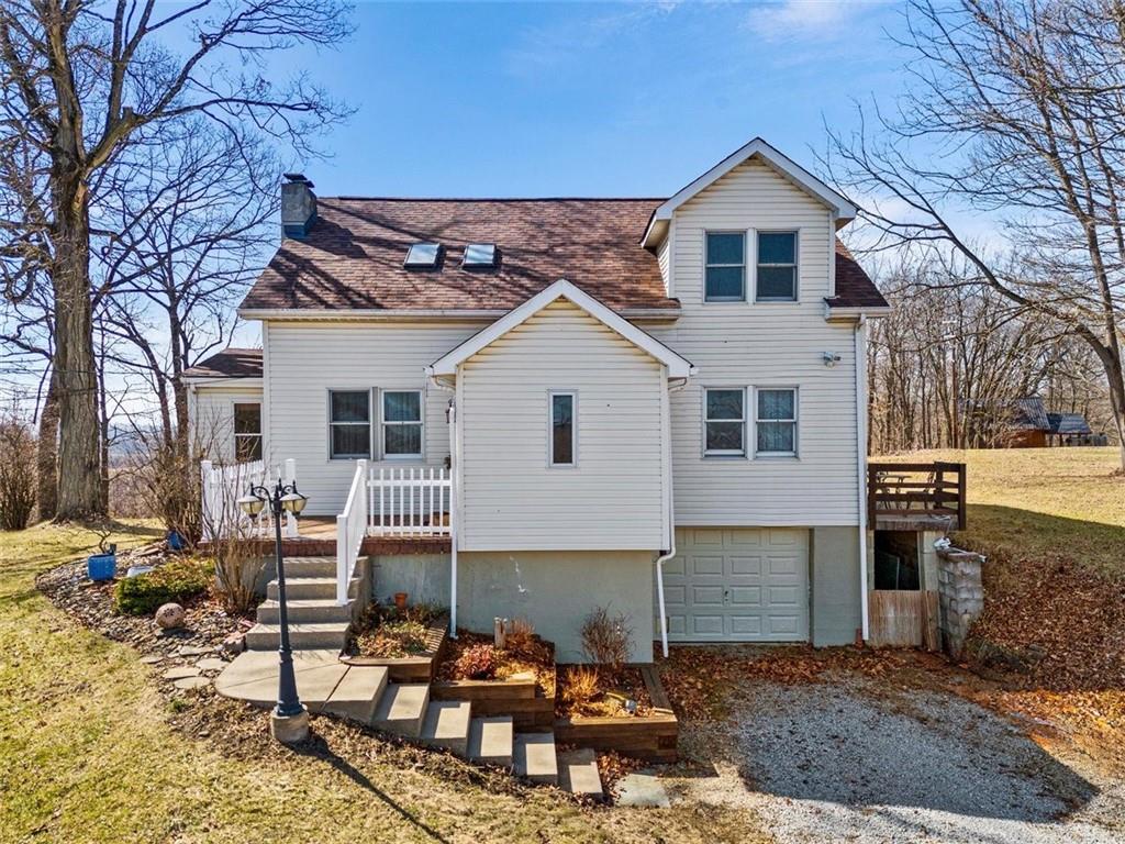 29 Profio Road McDonald, PA 15057 - Photo 2 of 44 a front view of a house with garden