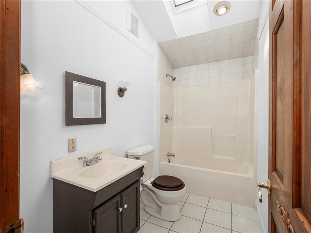 29 Profio Road McDonald, PA 15057 - Photo 21 of 44 a bathroom with a sink a toilet and shower