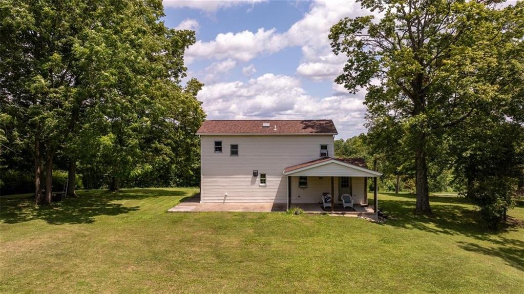 29 Profio Road McDonald, PA 15057 - Photo 32 of 44 a front view of a house with a yard and garage