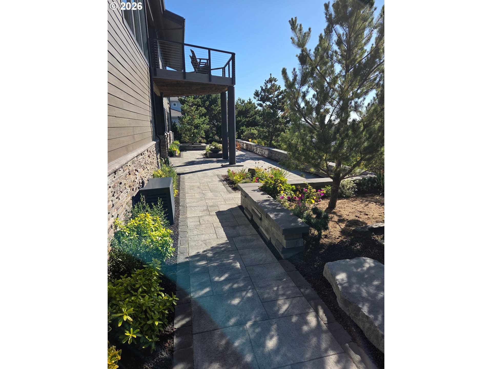 11 Fawn Ridge Lane Florence, OR 97439 - Photo 7 of 17 a view of a yard with plants and a fountain
