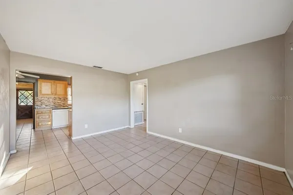 a view of an empty room and window