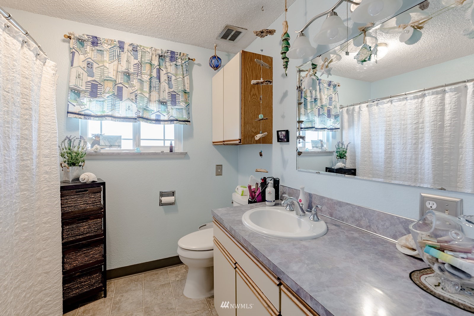 1209 Dundee Drive Cosmopolis, WA 98537 - Photo 16 of 36 a bathroom with a sink toilet and shower