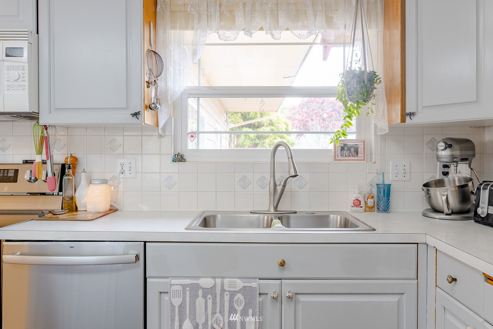 1209 Dundee Drive Cosmopolis, WA 98537 - Photo 24 of 36 a kitchen with a sink and a window