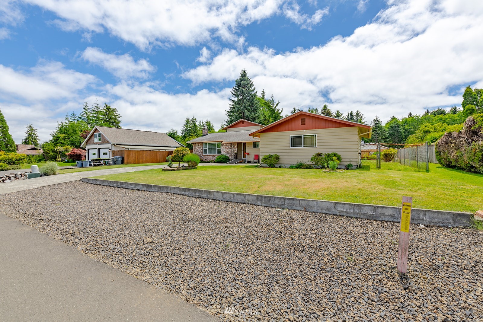 1209 Dundee Drive Cosmopolis, WA 98537 - Photo 5 of 36 a view of a house with a big yard and large trees
