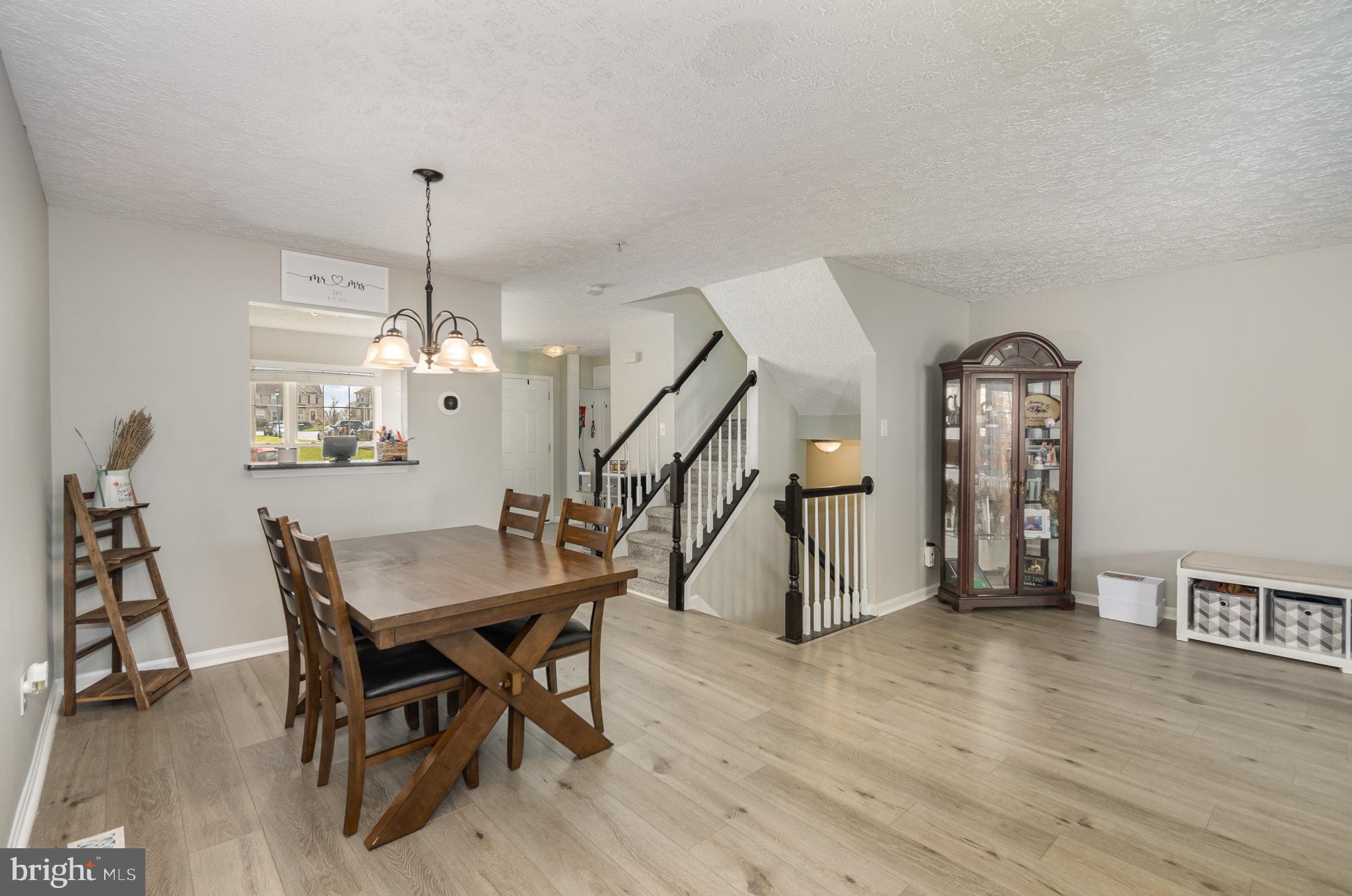 2114 Kyle Green Road Abingdon, MD 21009 - Photo 11 of 27 a view of a dining room with furniture and wooden floor