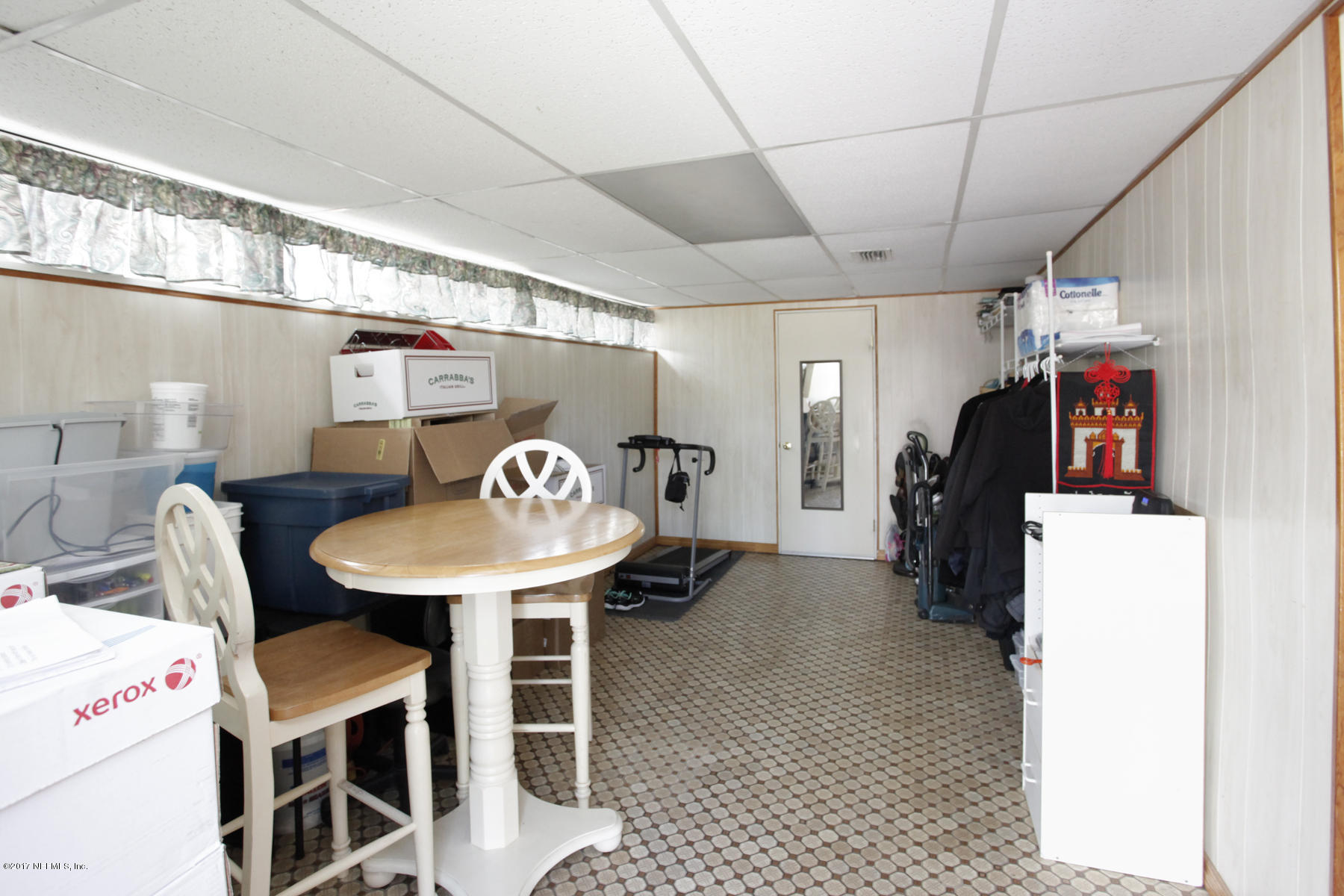 4956 Spring Glen Road Jacksonville, FL 32207 - Photo 13 of 23 a view of a storage and utility room with a sink