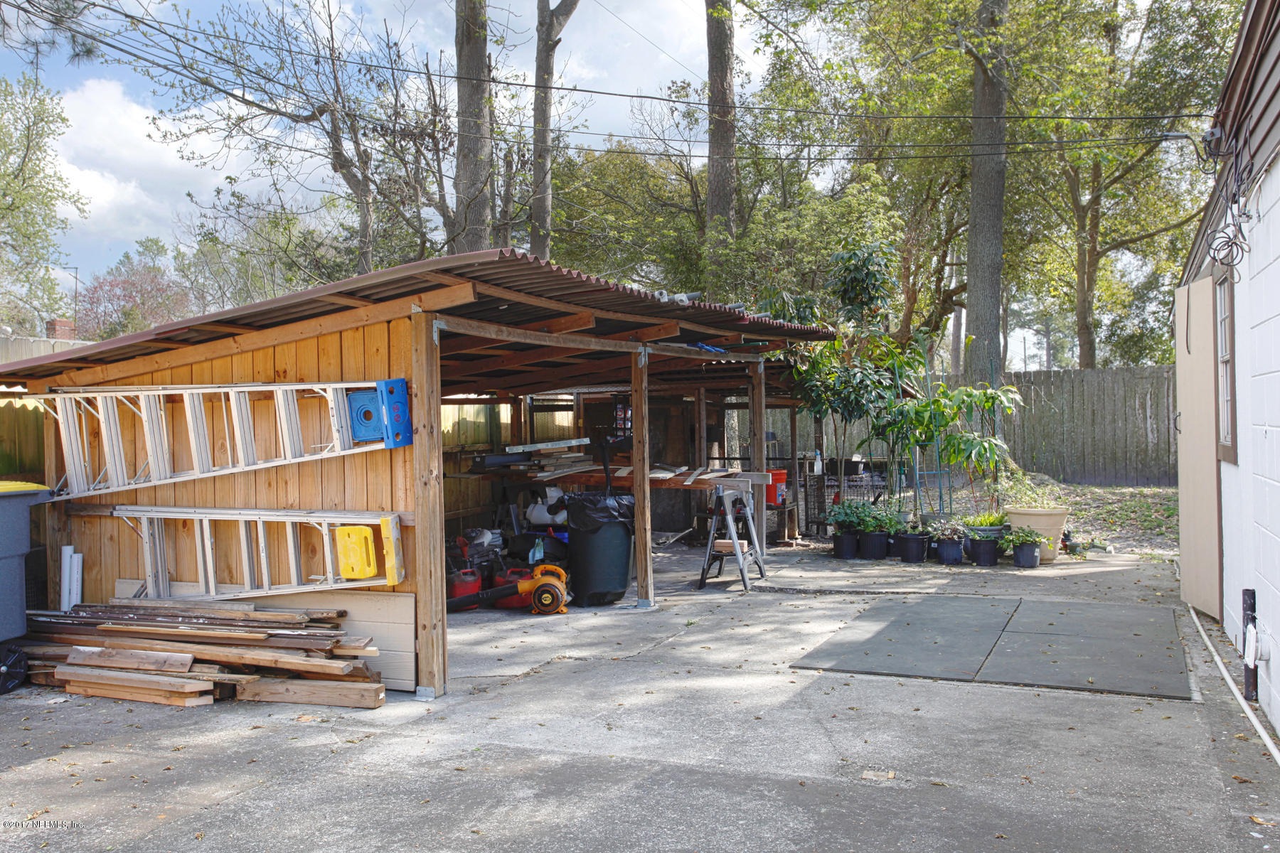 4956 Spring Glen Road Jacksonville, FL 32207 - Photo 21 of 23 a view of a car park in front of house