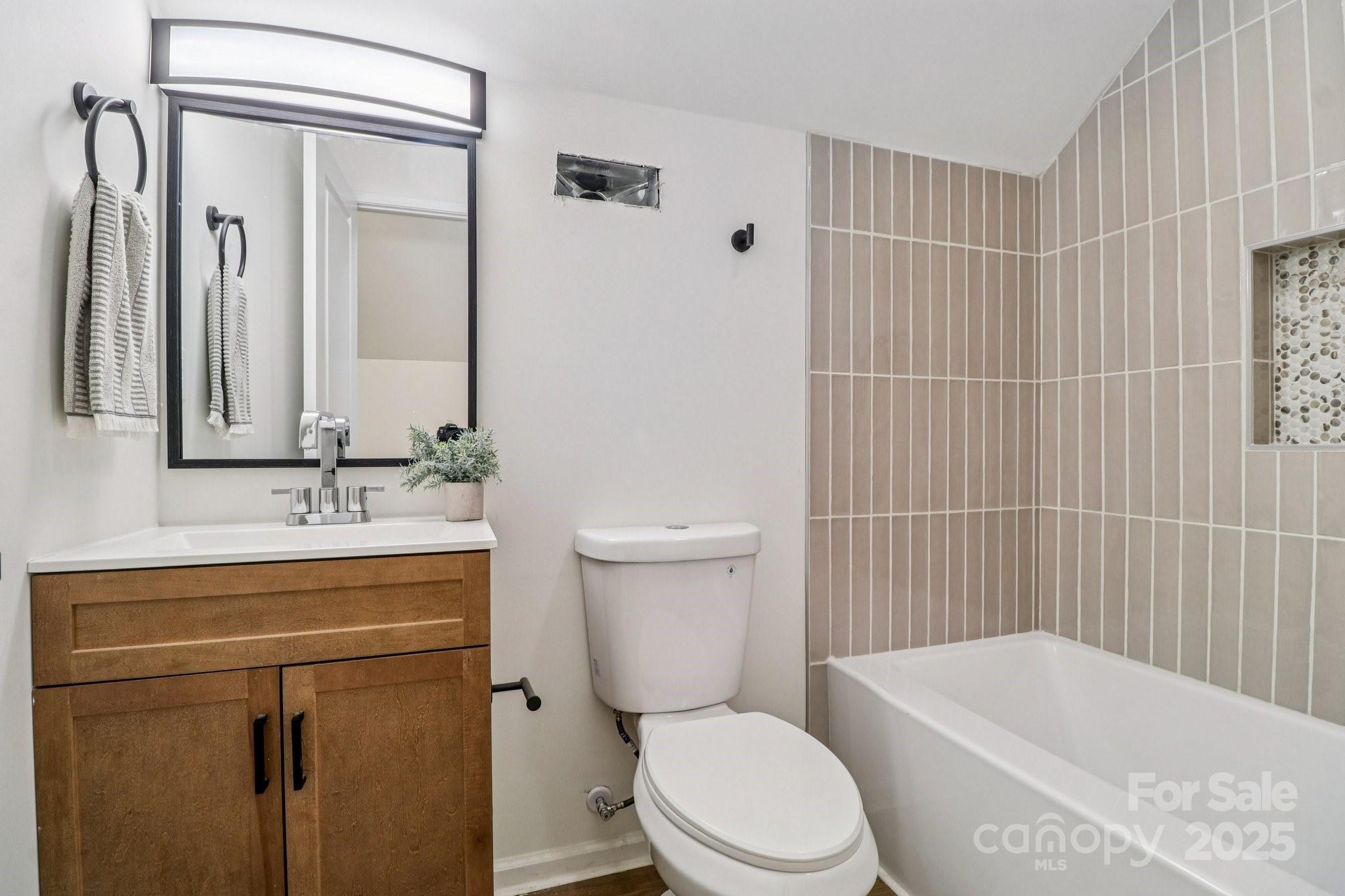 4409 Pleasant Road Lancaster, SC 29720 - Photo 11 of 34 a bathroom with a sink a toilet and shower