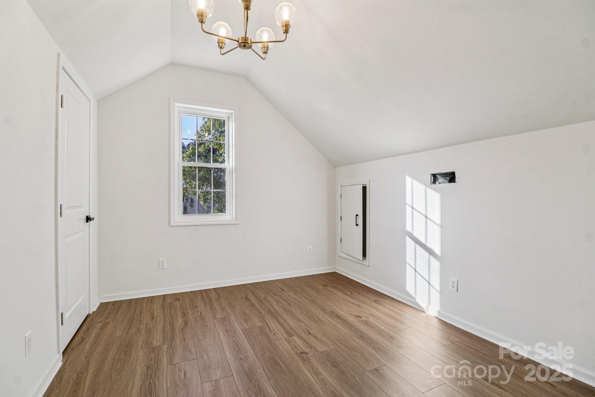 4409 Pleasant Road Lancaster, SC 29720 - Photo 19 of 34 a view of empty room with wooden floor and fan