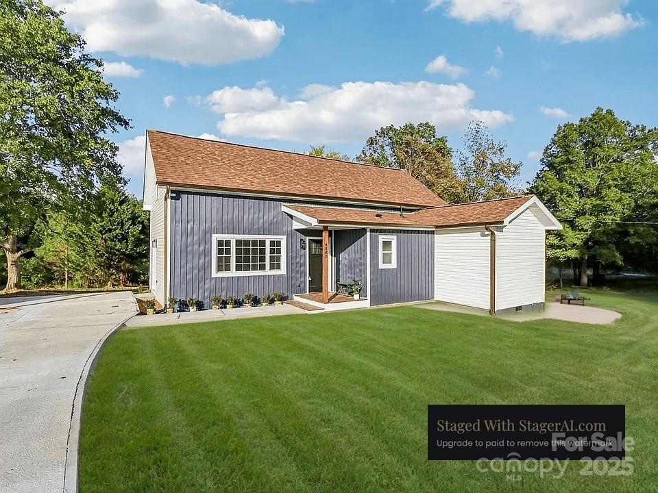 4409 Pleasant Road Lancaster, SC 29720 - Photo 26 of 34 a view of a house with a yard
