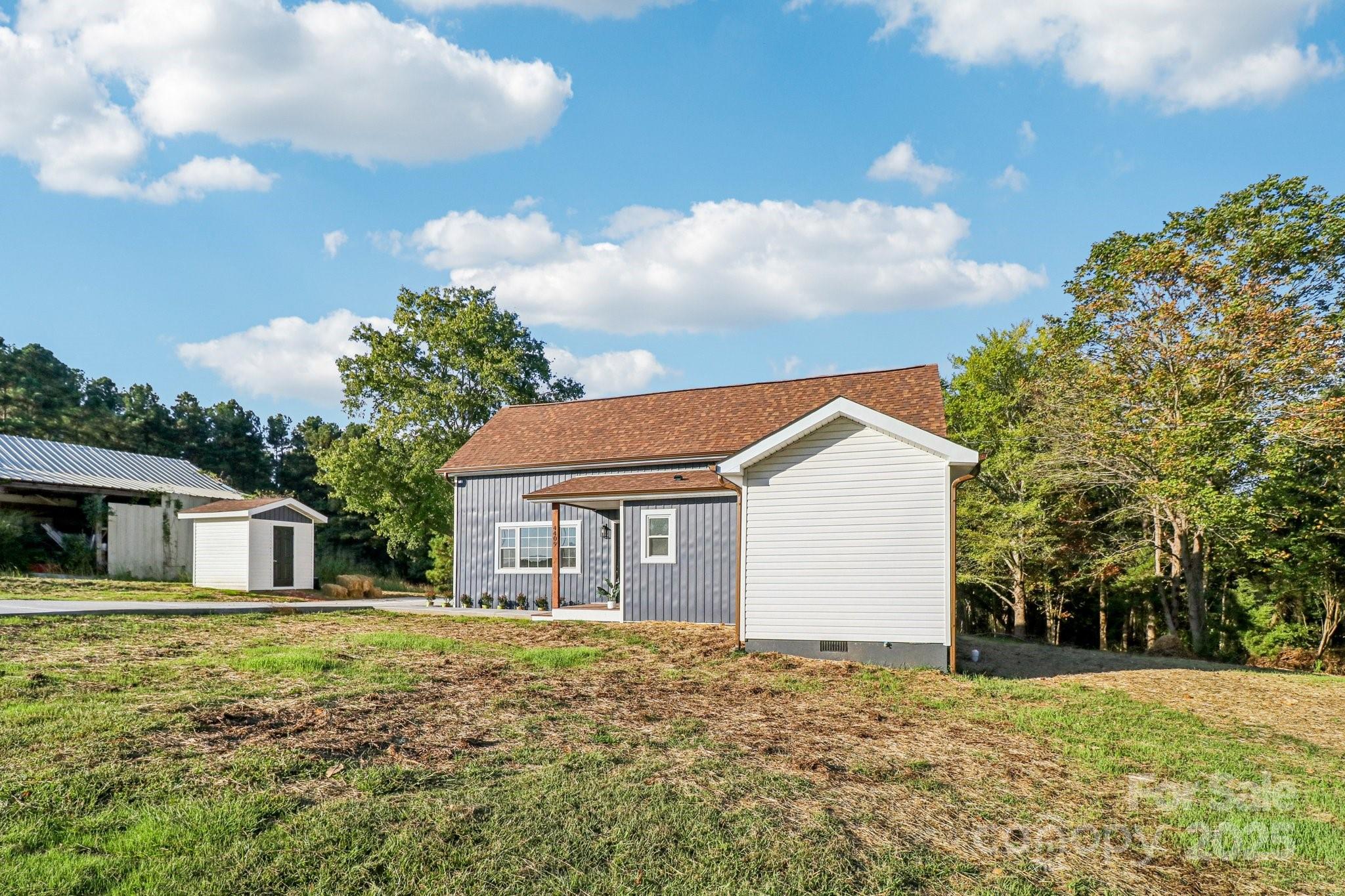 4409 Pleasant Road Lancaster, SC 29720 - Photo 31 of 34 a front view of a house with a yard